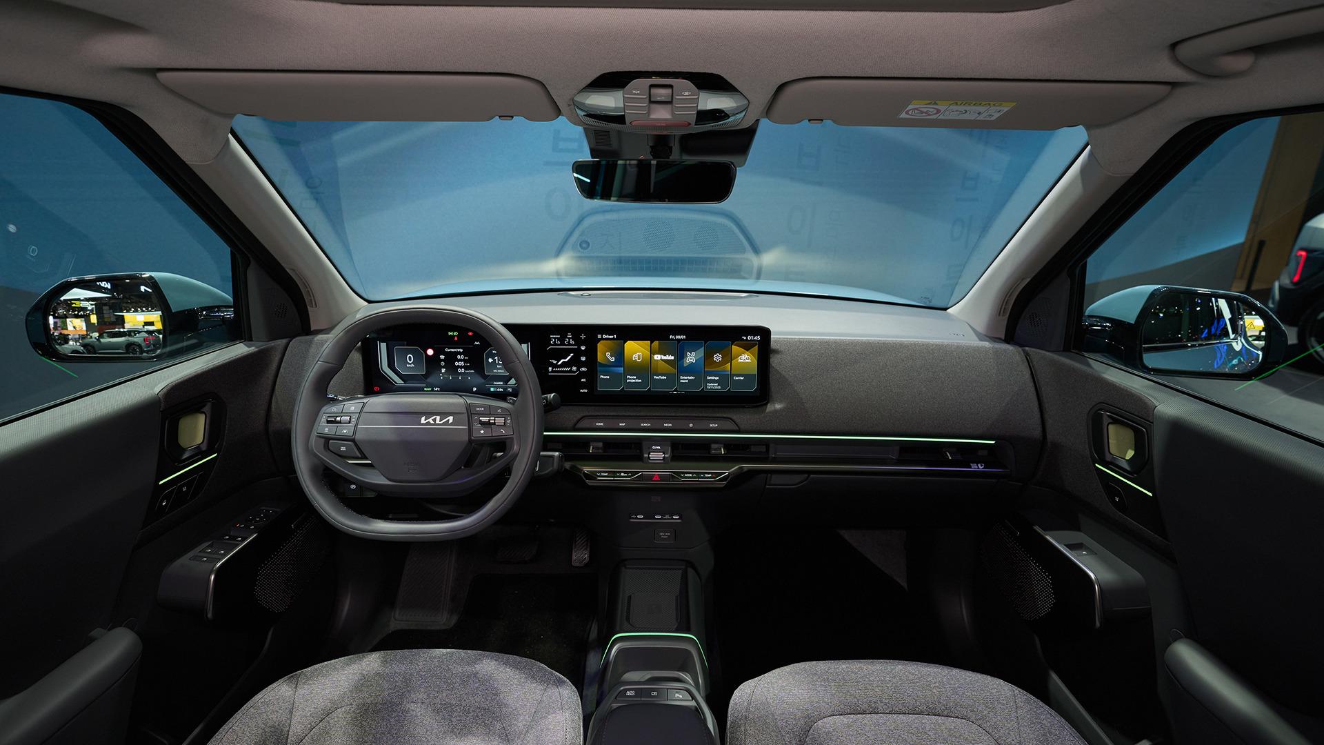 Kia EV2 cabin, showing the centre display and dark upholstery. Photo: Kia Europe