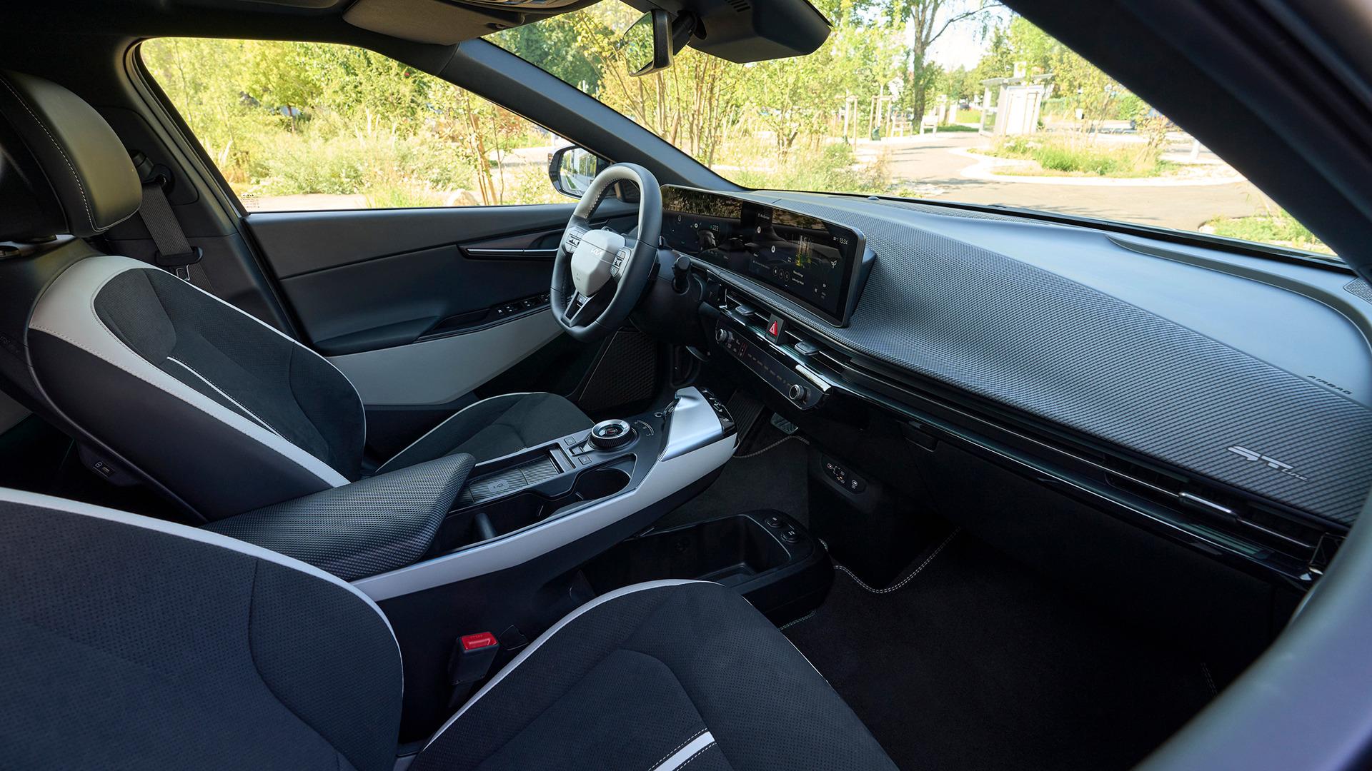 Kia EV6 cabin, showing the centre display and dark upholstery. Photo: Kia Europe
