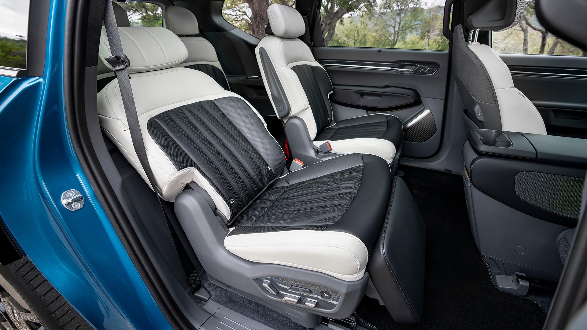 Kia EV9 cabin, showing the centre display and dark upholstery. Photo: Kia Europe